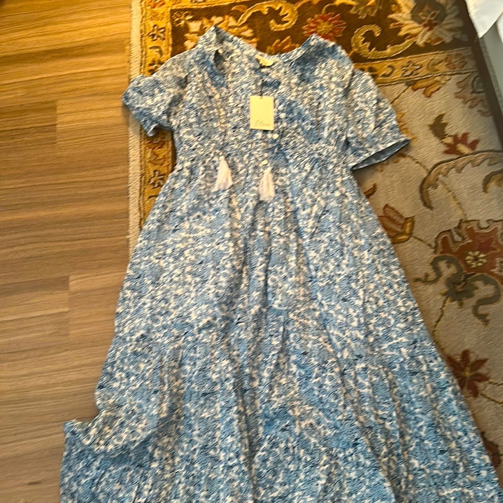 Sundress brand new with tags, size large and 100% cotton.